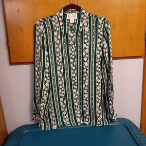 Diane von Furstenberg silk blouse  size small but runs large!
